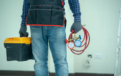 Person holding a tool box