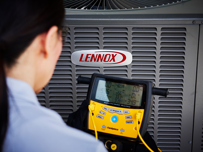 Man working on a Lennox AC